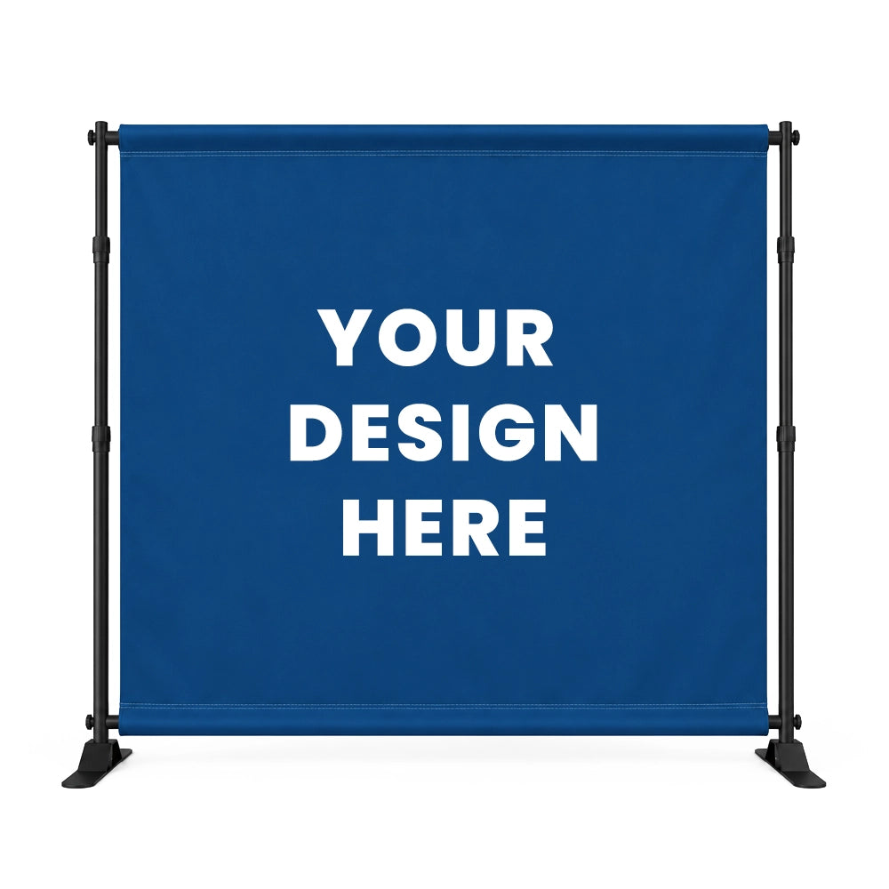 A blue customizable backdrop banner mounted on a black metal stand, featuring the white text 'YOUR DESIGN HERE' in the center, set against a plain white background.