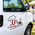 A white van at an outdoor event with a large 'JJ's Catering Services' logo printed on the side door. The logo features a chef's hat, red and black lettering, and a cloche icon.