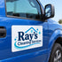 A white rectangular decal with the text 'Ray's Cleaning Services' in blue, featuring a small house icon and star accents, applied to the side door of a blue pickup truck.