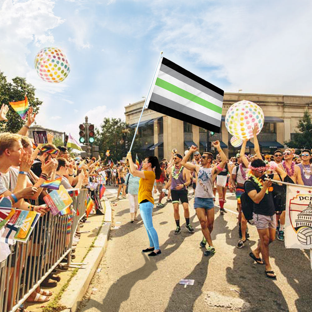 Woman Holding Agender  Printed Polyester Flag 3ft by 5ft on 6ft Hand Held Pole at Outdoor Parade
