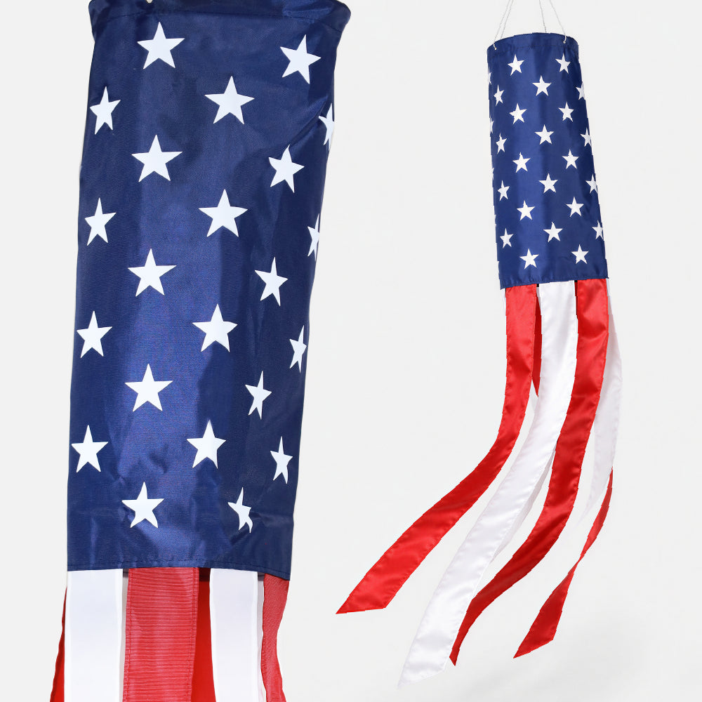 An American flag wind spinner shown from two angles against a plain white background, featuring a vertical section with white stars on a blue field and a horizontal section with red and white stripes.